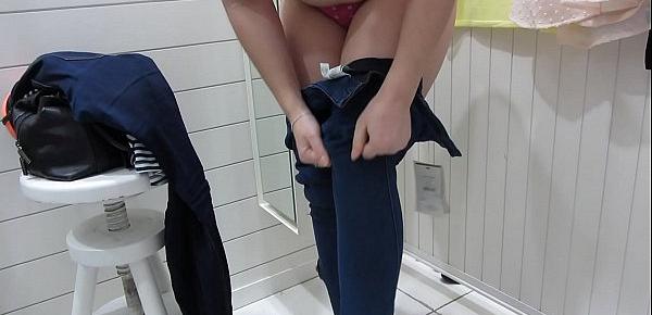  Nudity in public places, brunette with a juicy ass in the fitting room and on the street without panties.